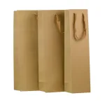 Shoppers portabottiglia in carta con corde in cotone